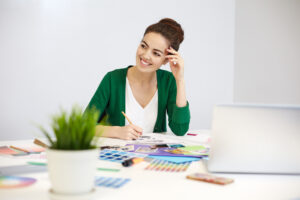 Woman thinking of a good B2B Business Tagline